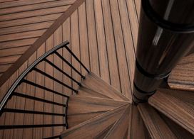 Trex® Spiral Stairs™ with Transcend Decking in Spiced Rum