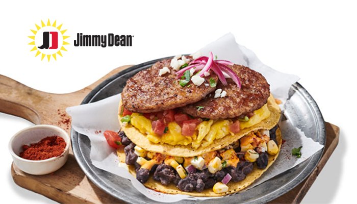 Breakfast tostadas with sausage links, egg, corn and black beans