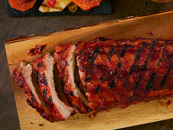 baby back ribs on a cutting board