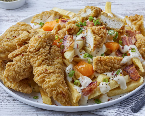 Image of chicken tenders on a plate. 