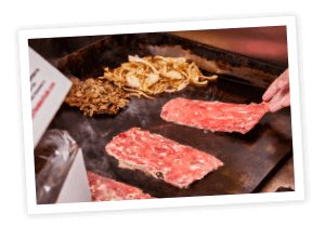 Grill with philly flat steaks and grill onions