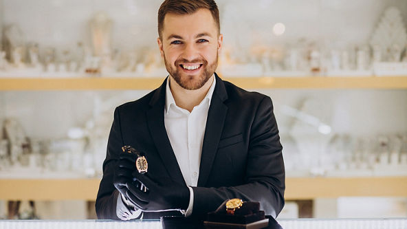 Sales man showing jewelry
