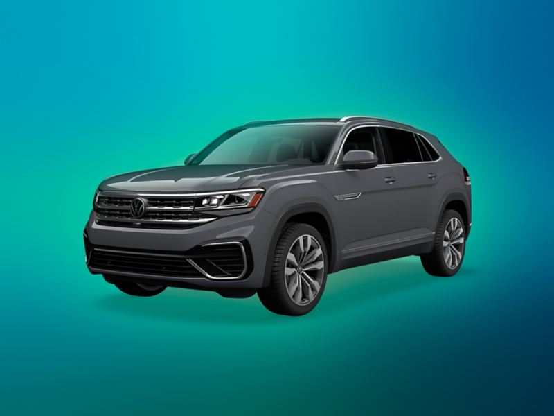 A three-quarter shot of an Atlas Cross Sport shown in Pure Gray on a vibrant, teal gradient background.