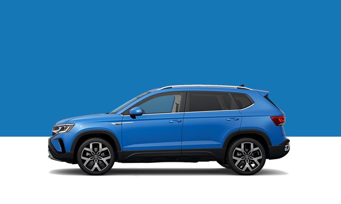 A side profile view of a Volkswagen Taos SEL in Pure Cornflower Blue.