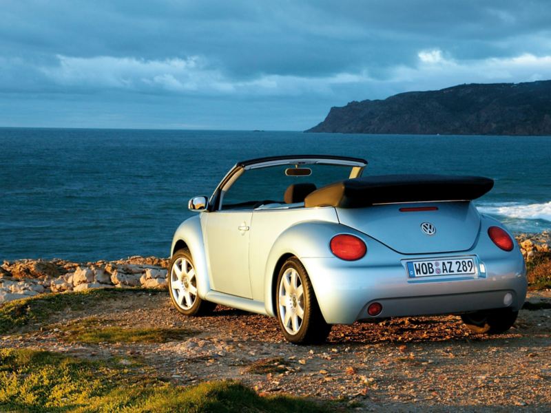 The 2003 Volkswagen New Beetle Convertible parked at an overlook.