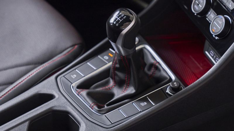 Closeup of 6-speed manual transmission shift knob in a VW Jetta GLI.