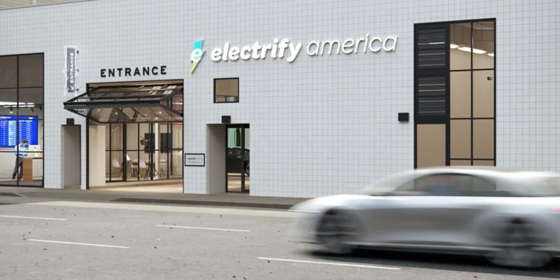 Photo illustration: exterior of an Electrify America charging station.