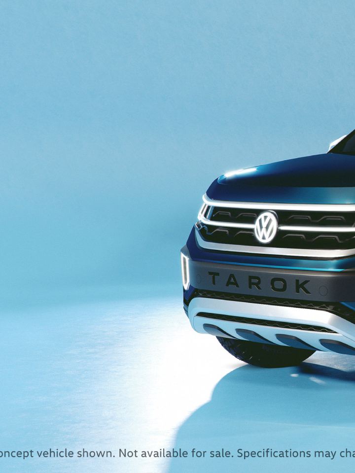 Product shot of Volkswagen Tarok concept in a studio, front 3/4 view. 