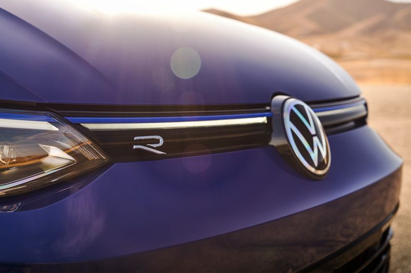 Close up of Golf R badge and VW logo on front grille
