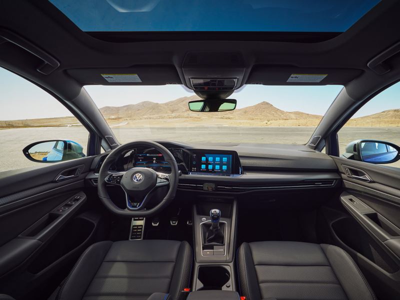 Golf R interior shown in Titan Black Nappa leather with desert landscape in background