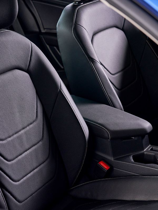 View of bolstered sport seats with leather seating surfaces as seen through the front passenger window.