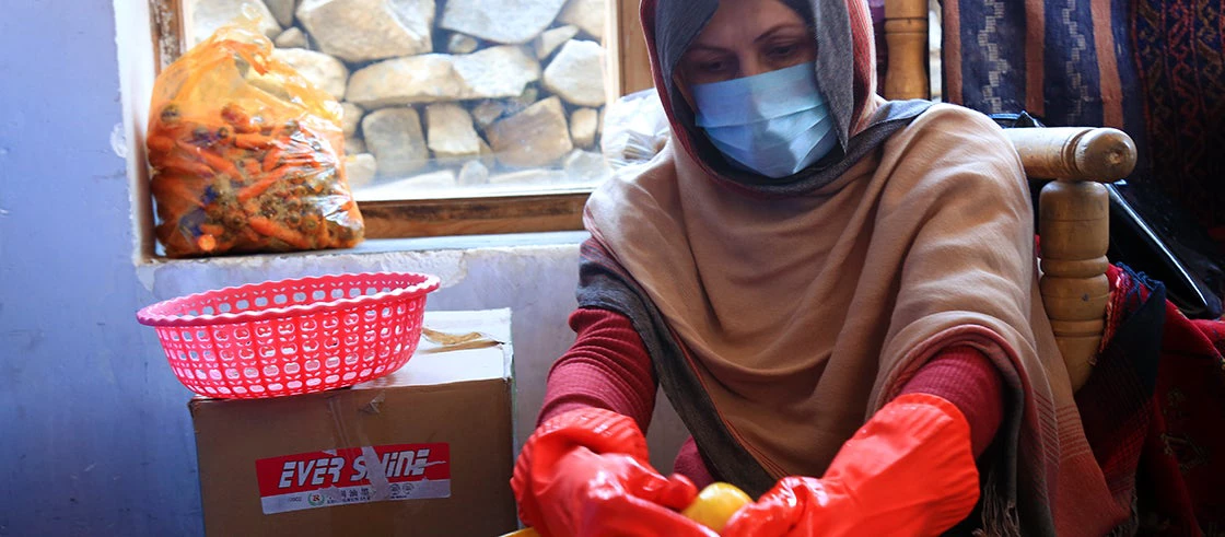 An Afghan woman working for small local business to support her family. Such business have been severely impacted by COVID-19 crisis. 