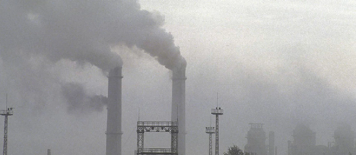 Smokestacks fill skyline. Photo: © Curt Carnemark / World Bank