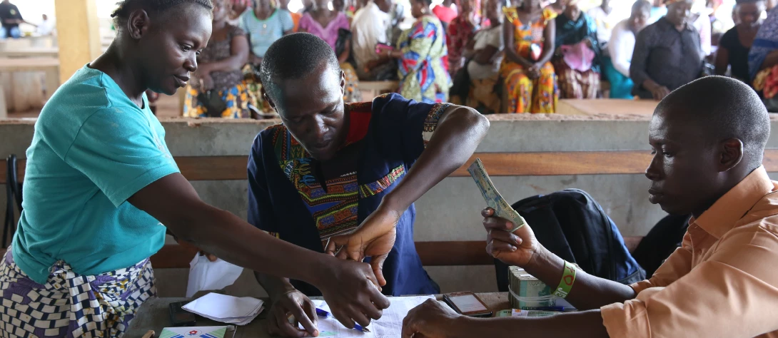 Studies suggest that mobile money cash transfer can be the most cost-efficient transfer method provided. Photo: Dominic Chavez/World Bank