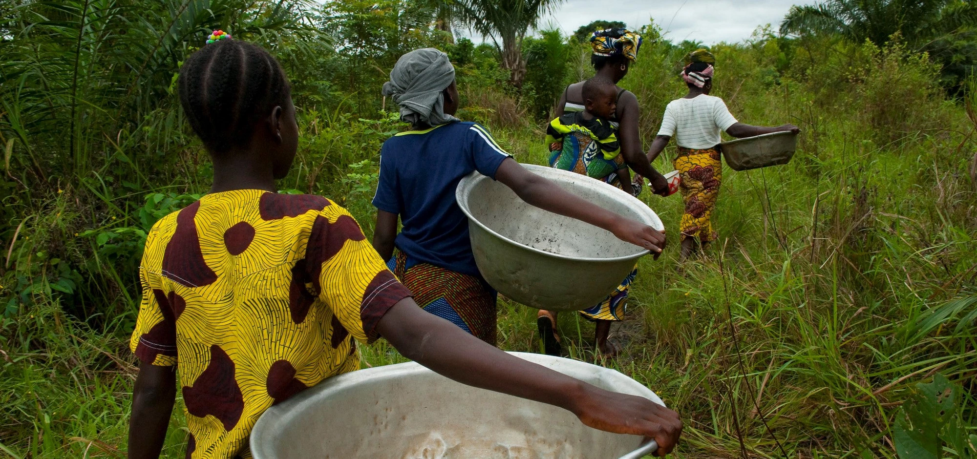 People are getting water in Benin. Photo: Arne Hoel / World Bank