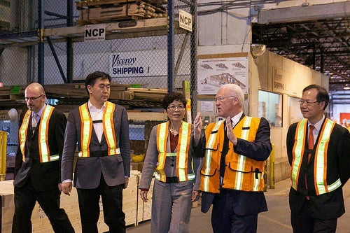Investors touring a factory in Canada. Source - Province of British Columbia