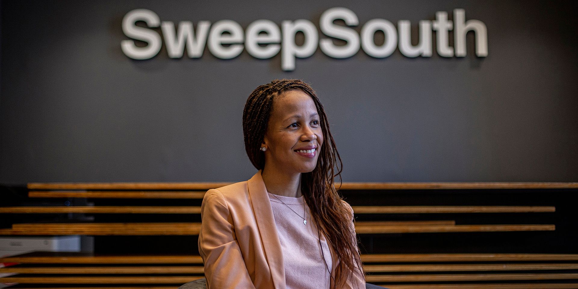 CAPE TOWN, SOUTH AFRICA - OCTOBER 29: 
Aisha Pandor, CEO and Co-founder SweepSouth, at the SweepSouth offices in Cape Town, South Africa, on the morning of October 29, 2020. SweepSouth is a tech company that matches domestic workers with homeowners through an app.

Photo © Charlie Shoemaker/International Finance Corporation