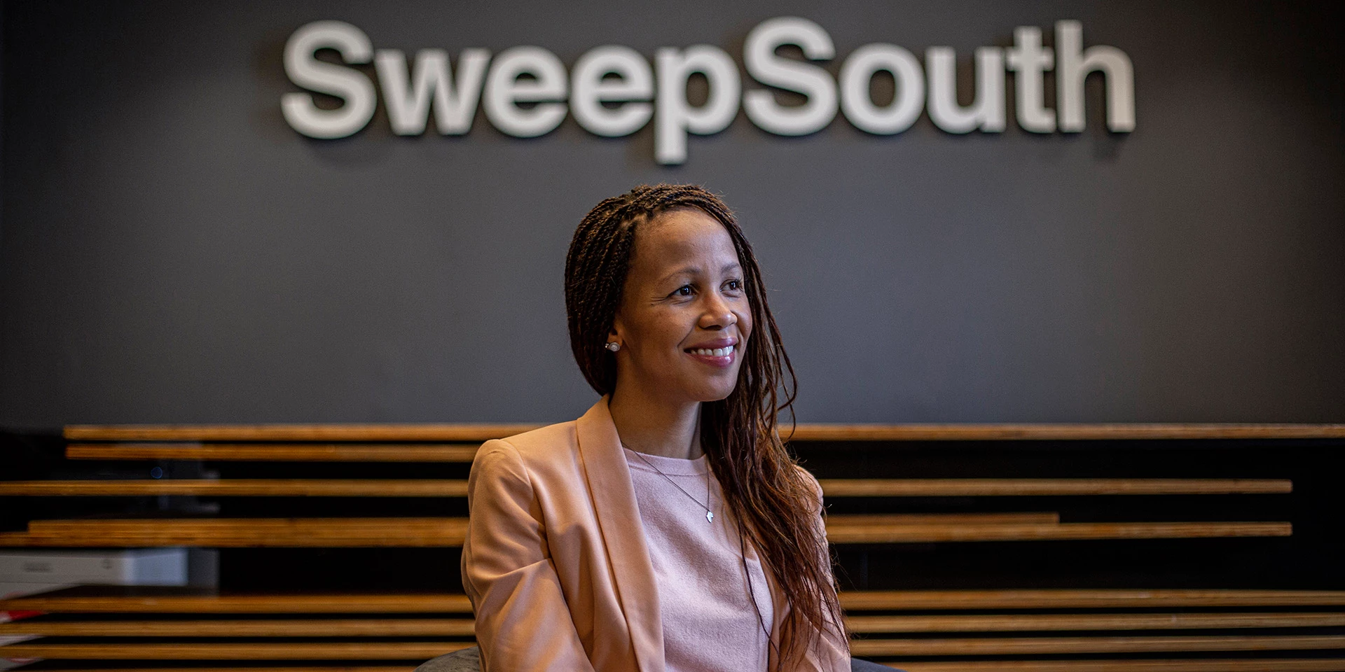 CAPE TOWN, SOUTH AFRICA - OCTOBER 29: 
Aisha Pandor, CEO and Co-founder SweepSouth, at the SweepSouth offices in Cape Town, South Africa, on the morning of October 29, 2020. SweepSouth is a tech company that matches domestic workers with homeowners through an app.

Photo © Charlie Shoemaker/International Finance Corporation