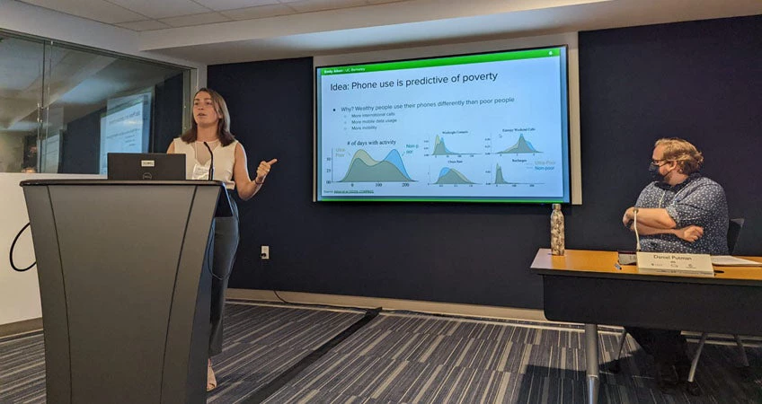 Emily Aiken presents her research using mobile data to predict poverty and target aid in Togo. 