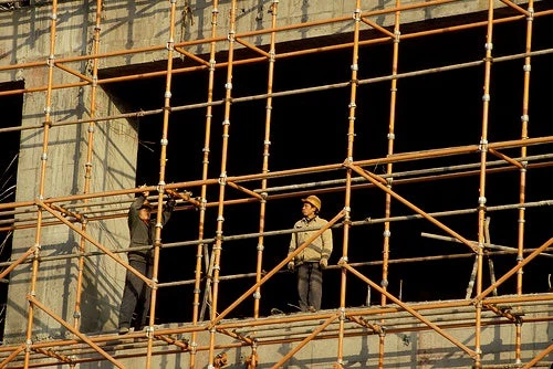 Construction worker, Sichuan, China. Photo: © Curt Carnemark / World Bank
