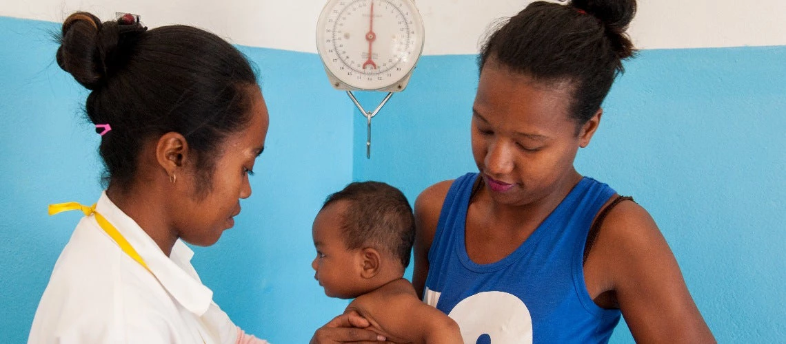 Doctor treating a baby