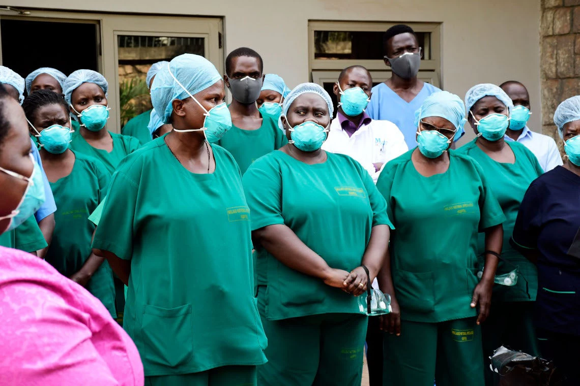 Health workers at the National Referral Hospital in Mulago during COVID19 lockdown. Equipping and training community health workers in digital data collection would generate real-time data for disease surveillance and monitoring.