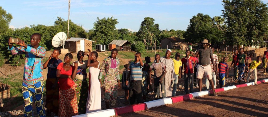 The residents of the Bamingui locality came to see the first vehicles pass over the new bridge. Credit: UNOPS/Sarah Bernolet