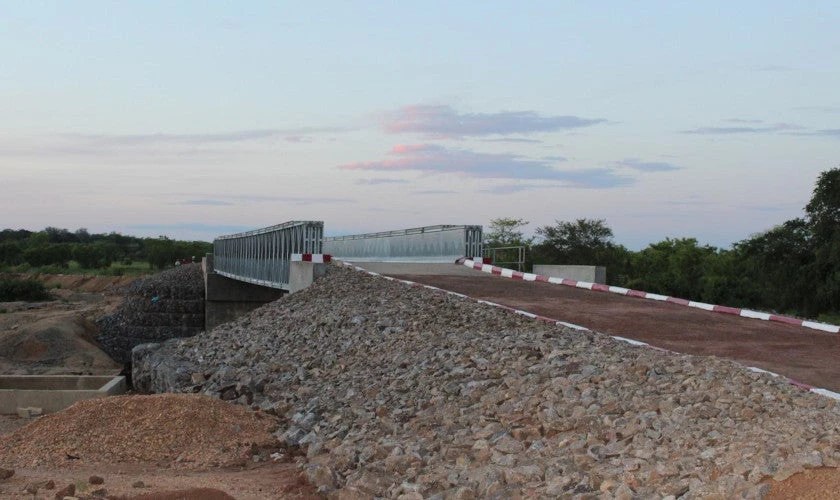The completed Bamingui Bridge, a 45 meter long  and 4 meter wide steel structure with a pedestrian walkway, is built to withstand the elements and for all-season accessibility. Credit: UNOPS/Sarah Bernolet