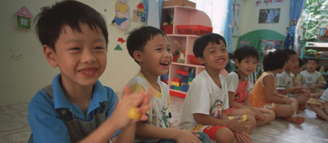 Children singing in a class at a public preschool