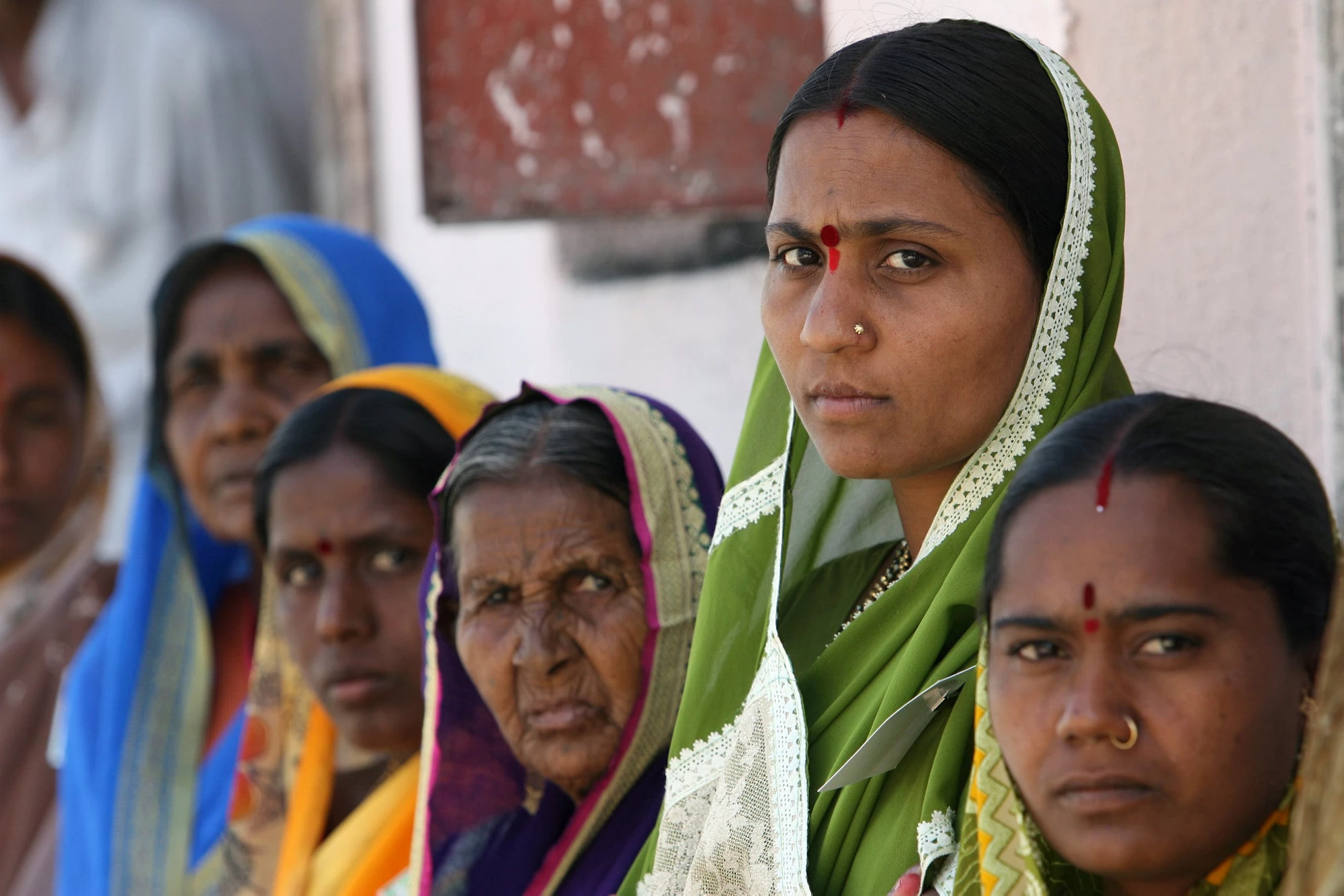 Indian women looking at the camera.