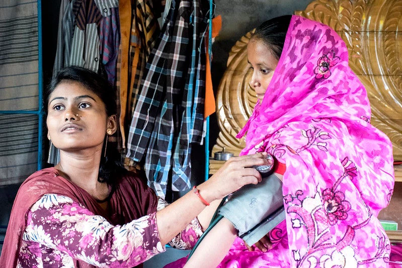 Women at a health center outside of Dhaka. 