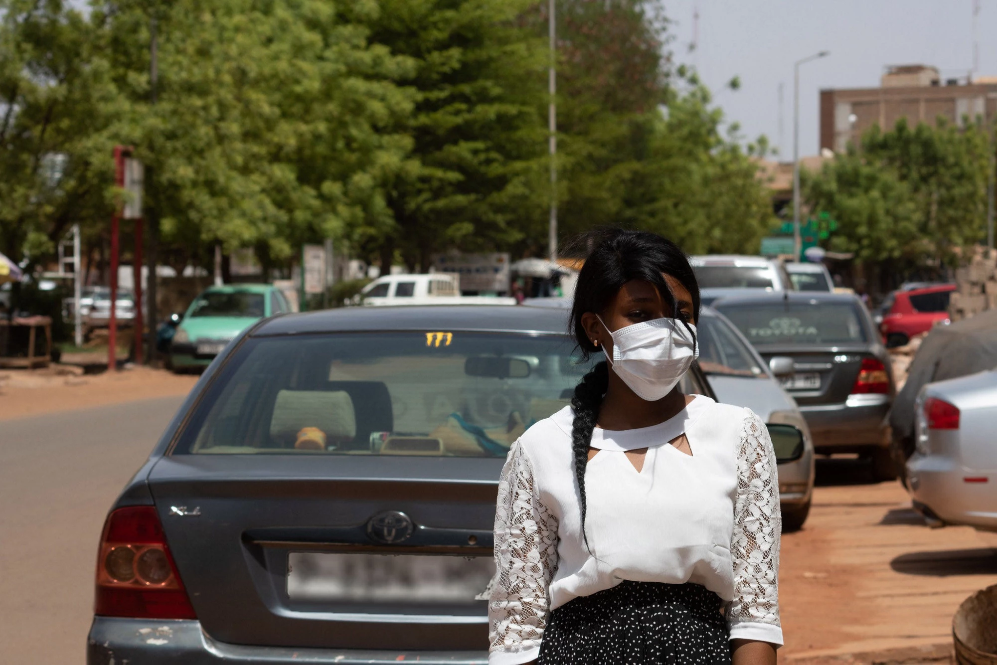 Woman wearing a mask. Photo: World Bank / Ousmane Traore (MAKAVELI)