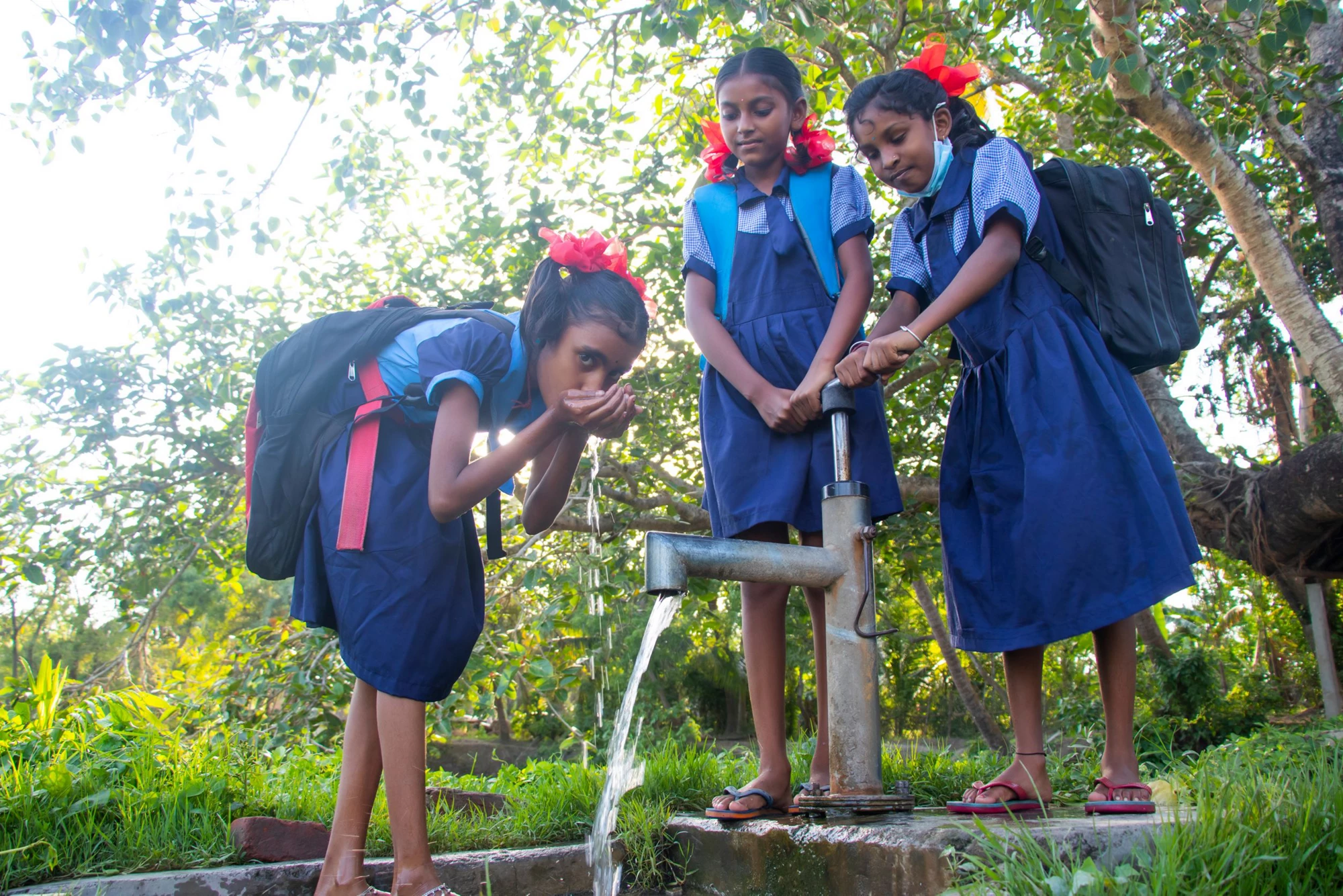 girls drinking water