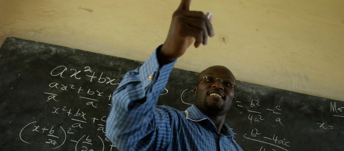 Winston Mills-Compton teaches a class in mathematics at the Mfantsipim Boys School in Cape Coast, Ghana