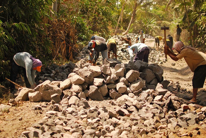 Rebuilding a road after eruption of Mount Merapi. Yogyakarta, Indonesia
