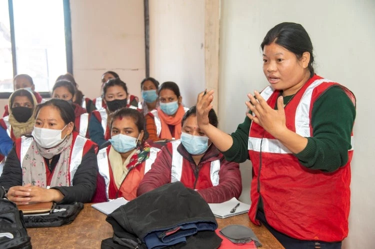 Kanchhi Tamang from Nuwakot shares her experience with fellow women masons during the Skill Enhancement and Diversification Training   