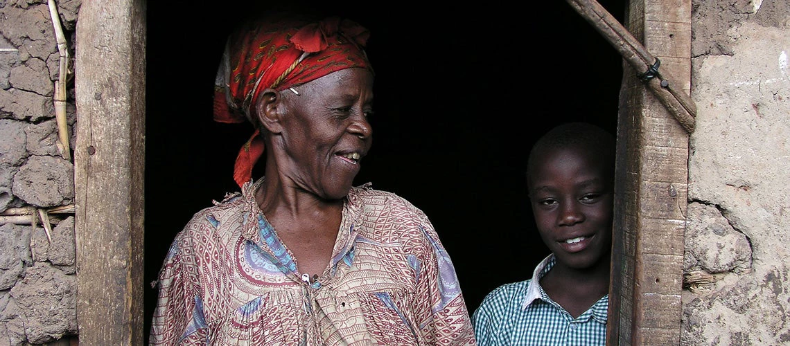 Sambi Edward and his grandmother. Kampala. Uganda. Photo: Arne Hoel / World Bank