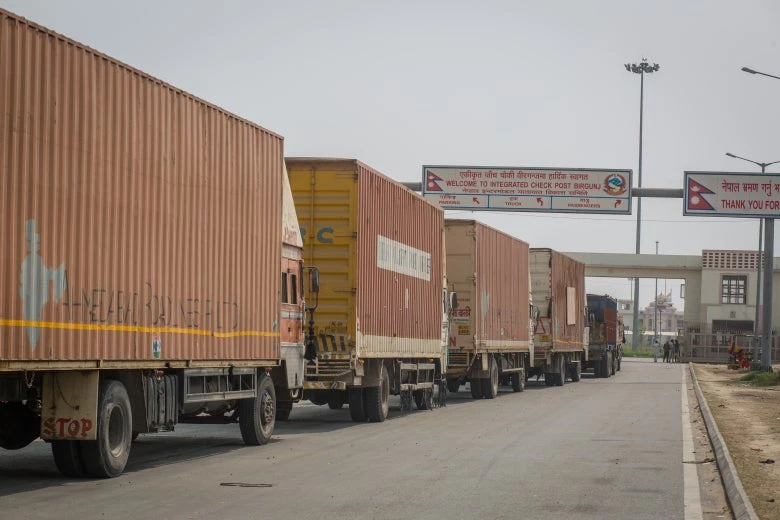 Cargo trucks move from Nepal's border to India. Photo: World Bank/Nabin Baral