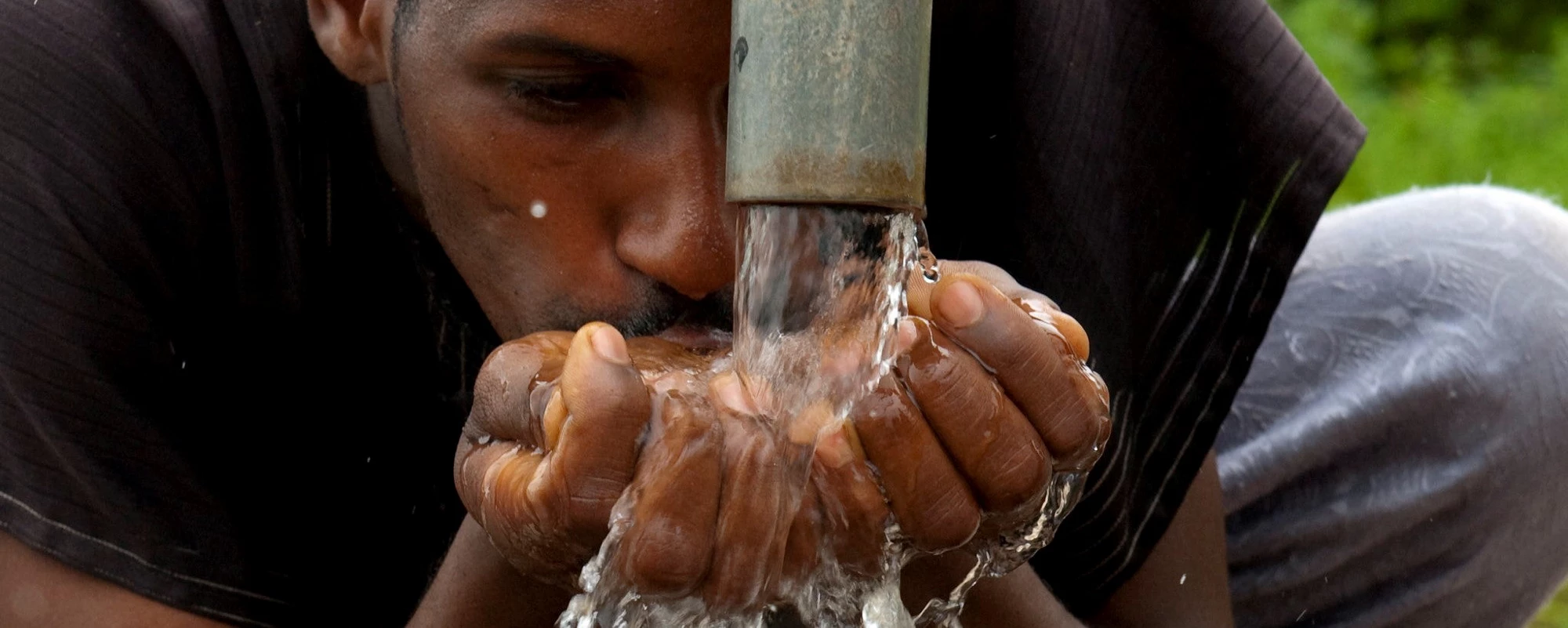 A beneficiary of the water and sanitation infrastructure project. Photo: Arne Hoel / World Bank