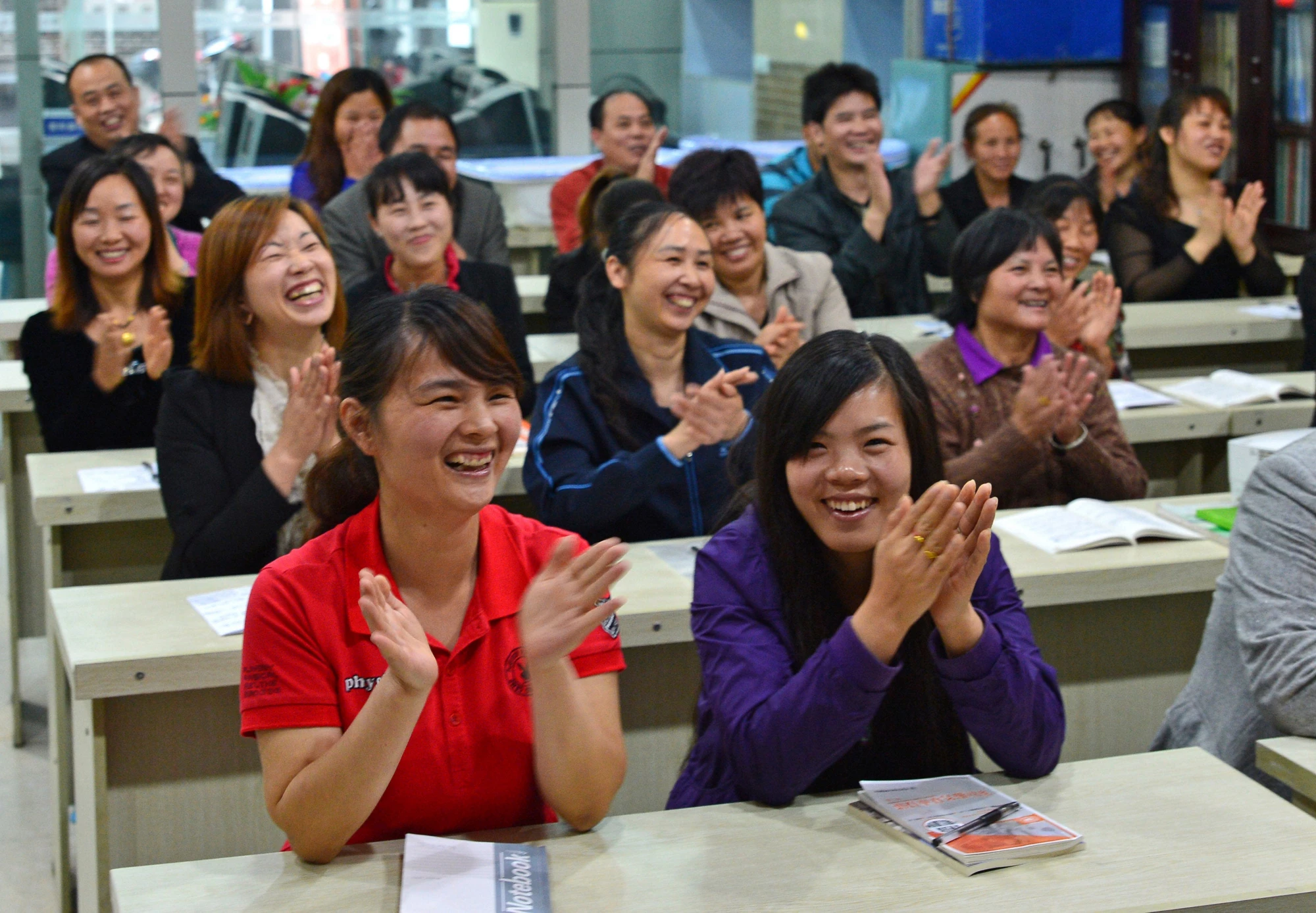 Adult students in a classroom receiving skills training