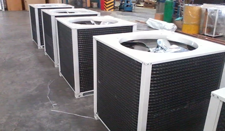 New air conditioning units manufactured in a factory.