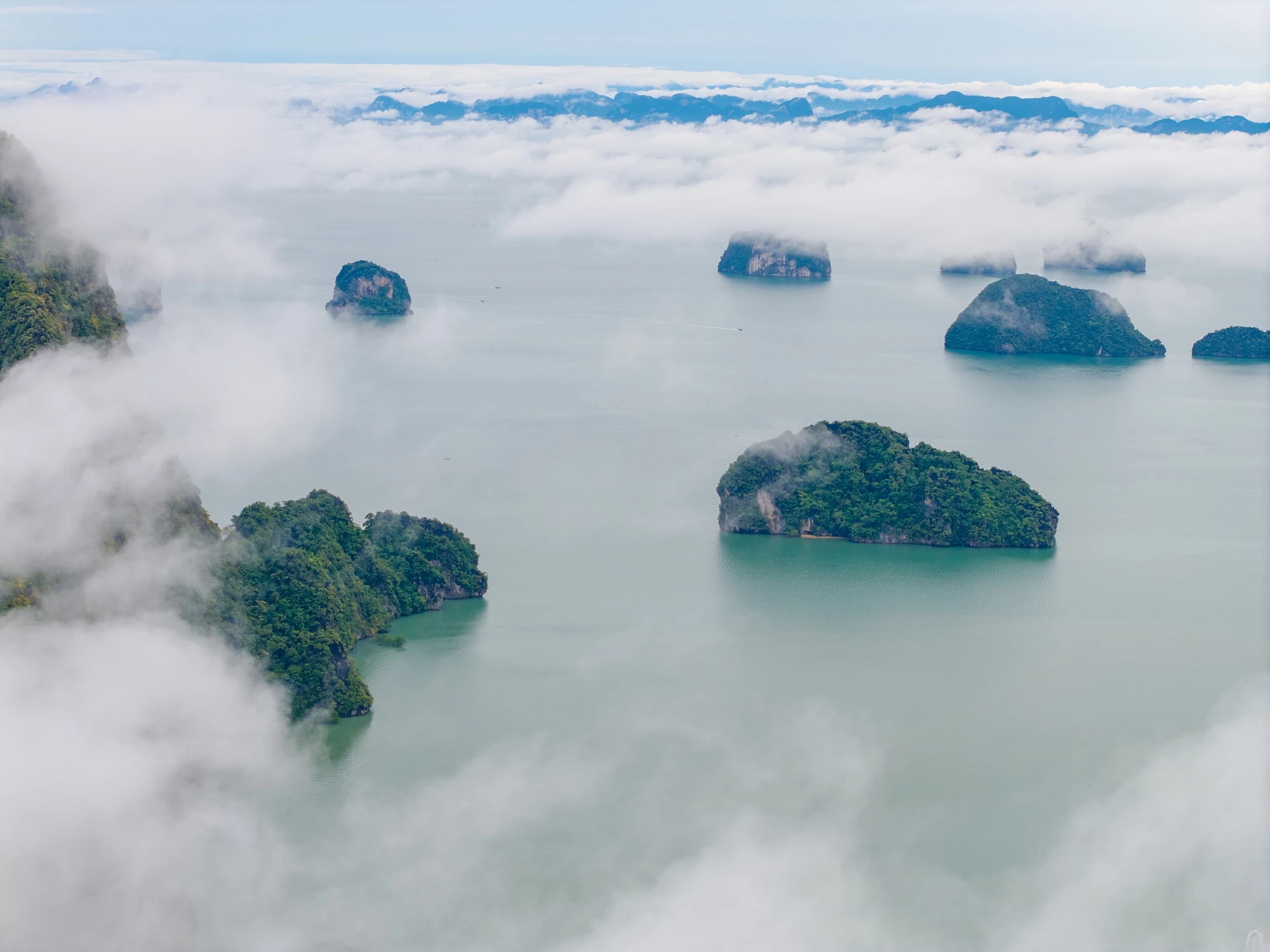 Beautiful nature of Thailand, sunset landscape Phang Nga bay in turquoise sea, aerial view. Travel trip on Asia concept.