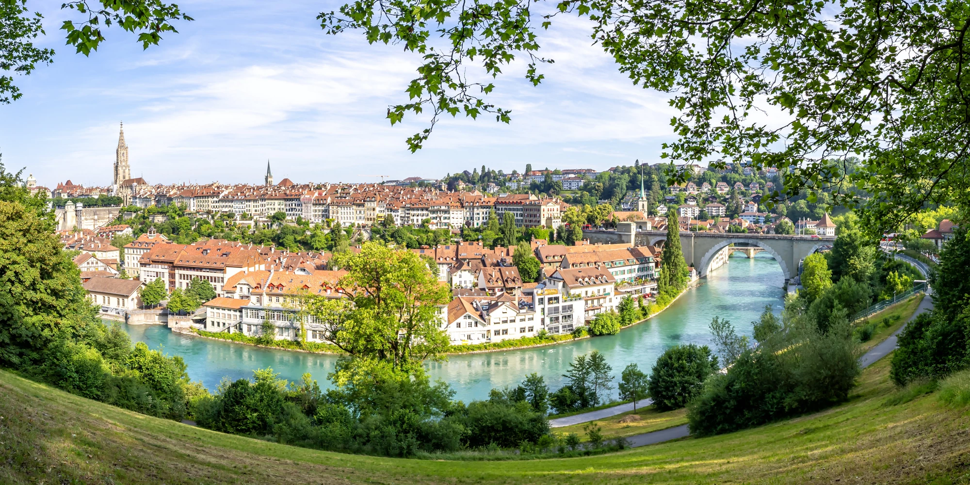Bern city town on the river Aare old town with church Berner Munster panorama in Switzerland