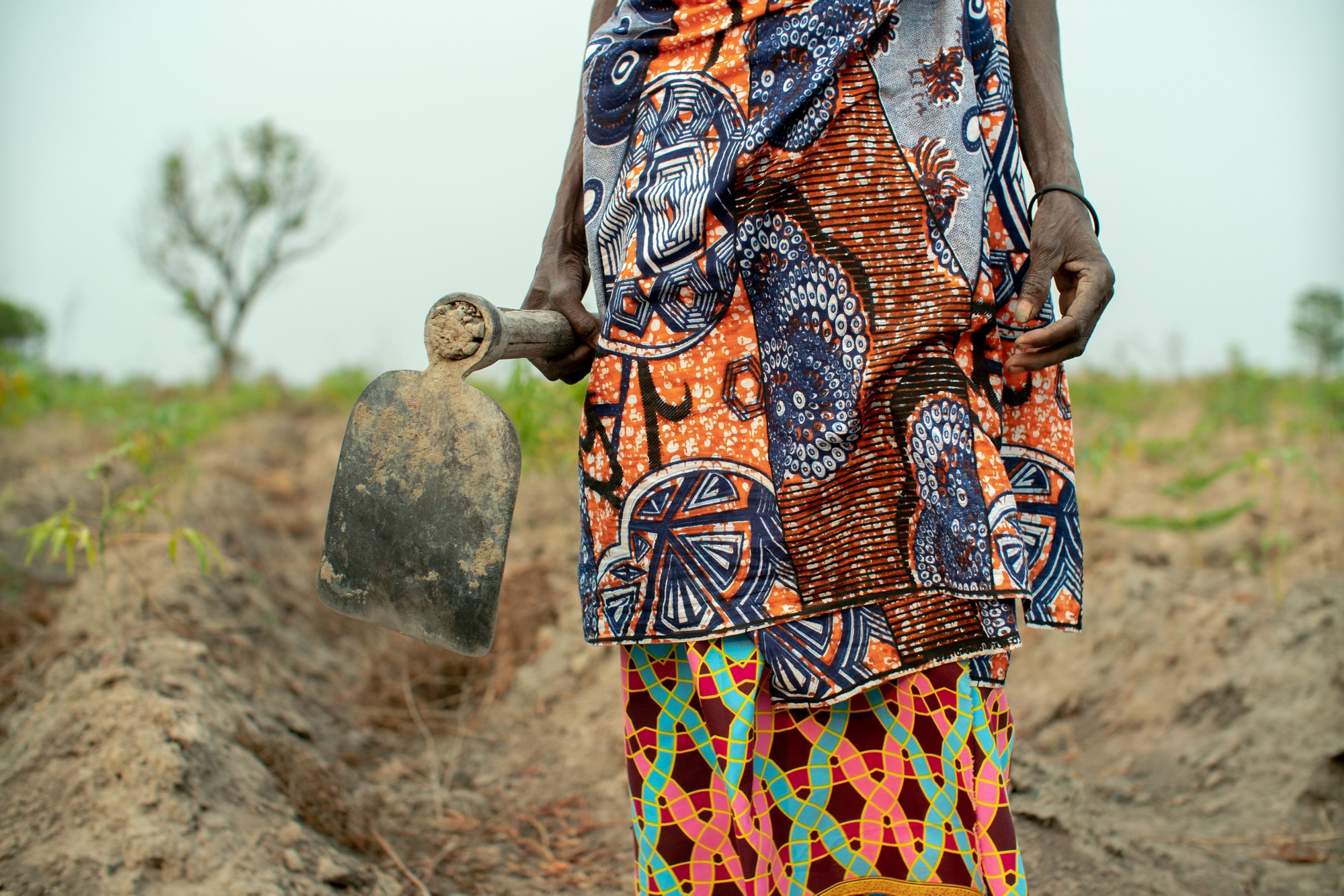 Local farmer dressed in colorful african cloths, Angola 2019