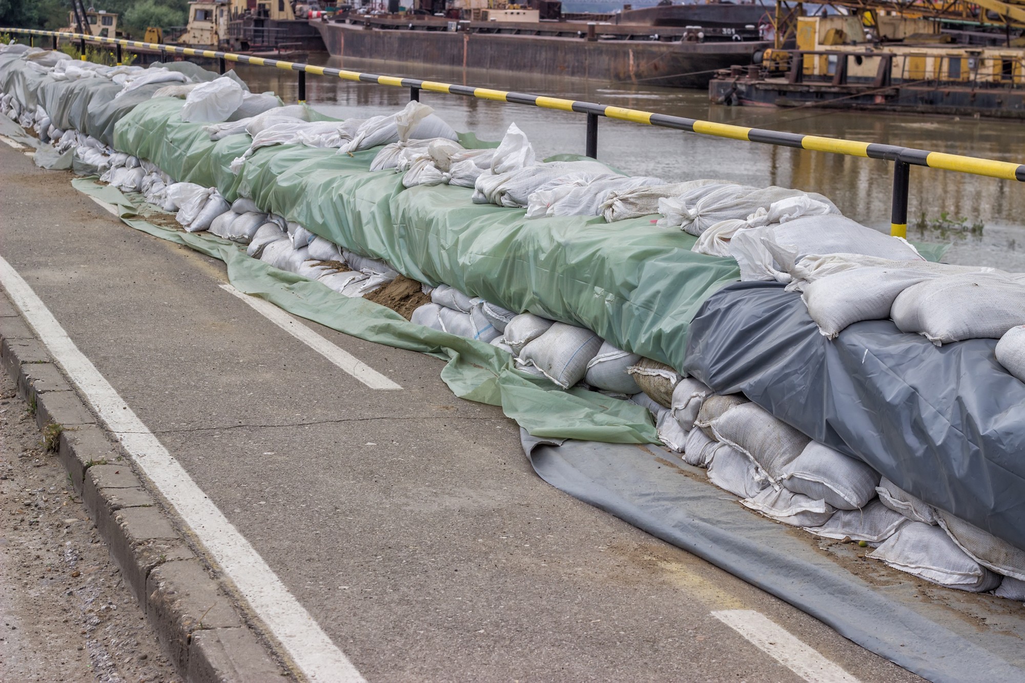 Wall of sandbags for flood defense, sandbag barricaded