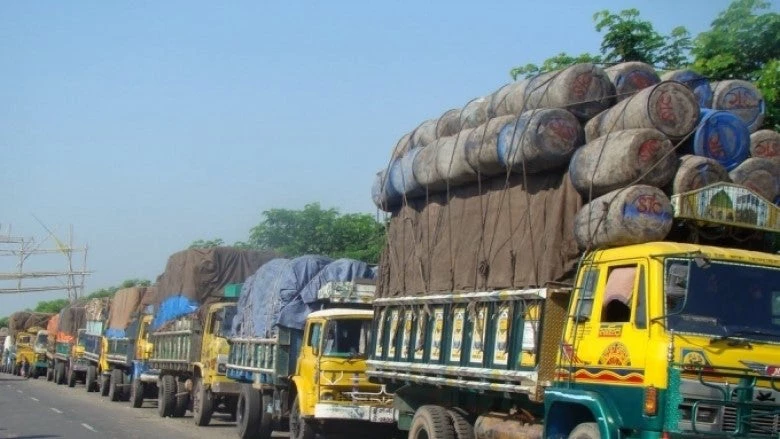 Trucks lining up to be loaded with freight in Bangladesh.