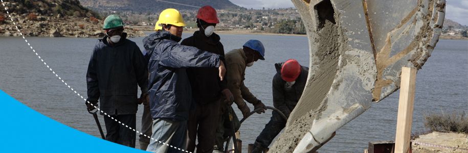 A group of men working near river