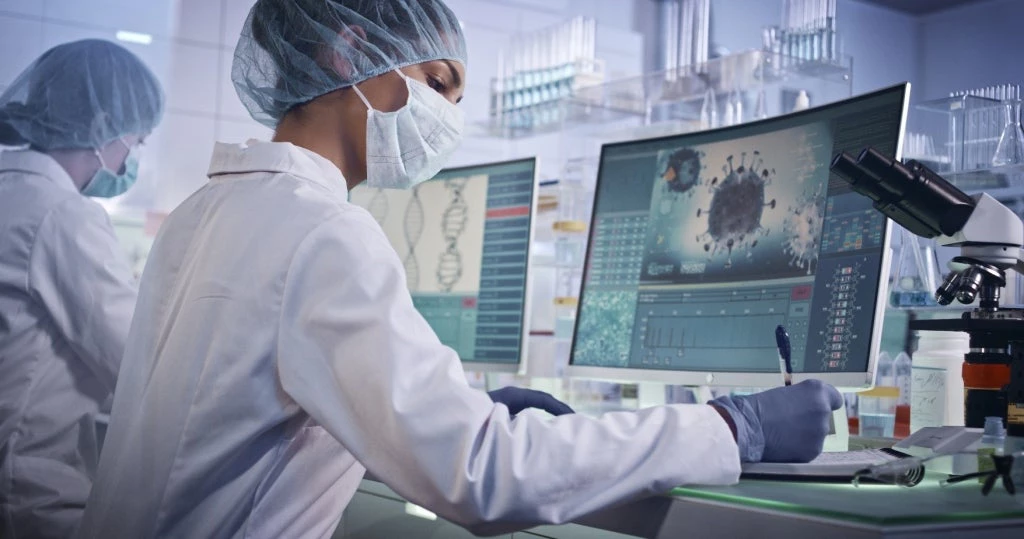 Scientists working on COVID-19 in their lab. Photo: Janiecbros/Getty Images