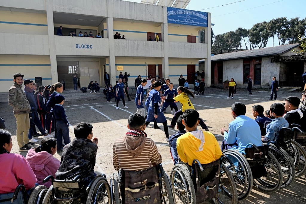 Children in Khagendra Nawajiwan Kendra Secondary School in Nepal participate in sports day program.