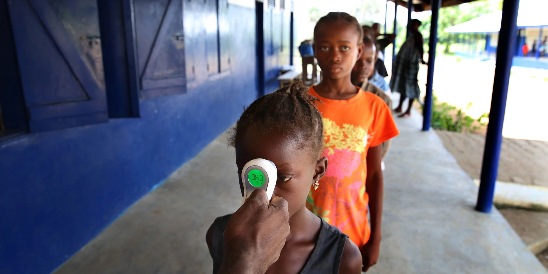 Students temperatures are taken at Billy Town Public School in Billy Town Liberia on March 5, 2015. Photo © Dominic Chavez/World Bank